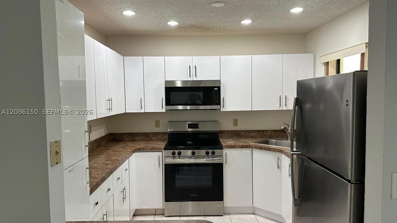 3679 Cocoplum Cir #3528 - Photo 6 of 31