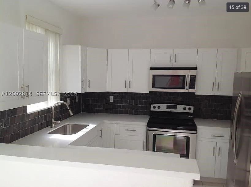 6980 Nw 177th St #L101 - Photo 5 of 11