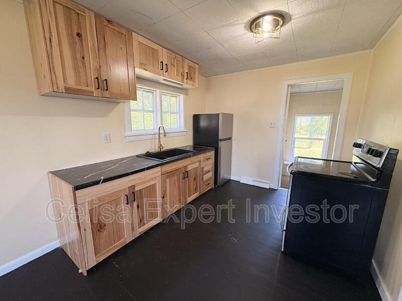 6418 Huguenard Rd - Photo 3 of 8