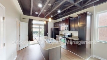 featured image of 225 E 1st St