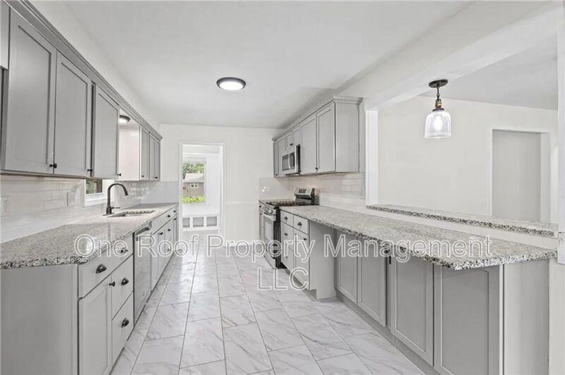 8105 E 80th Ter - Photo 2 of 33
