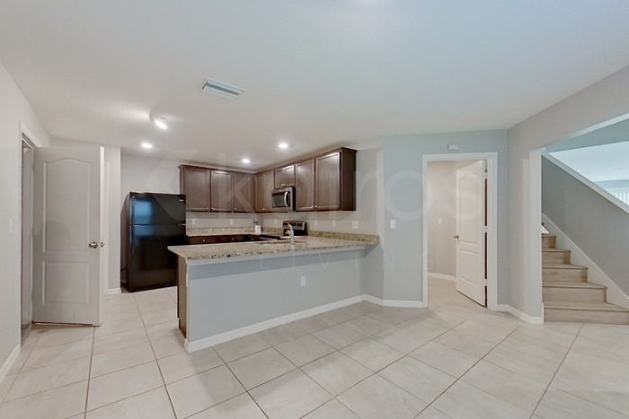 8409 Indian Laurel Ln - Photo 5 of 25
