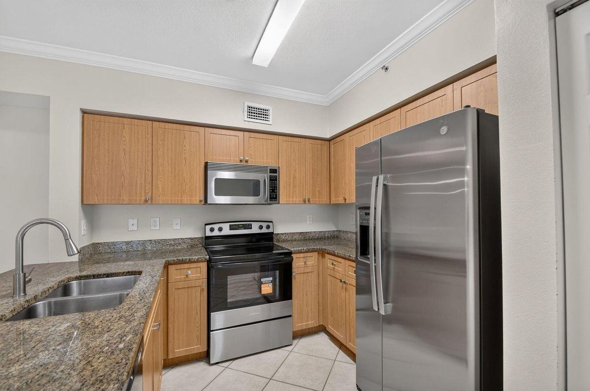 6370 Emerald Dunes Dr ##203 - Photo 2 of 10