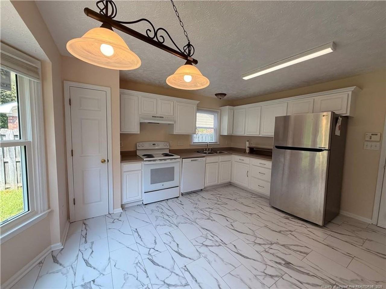 7229 Tollhouse Dr - Photo 5 of 15