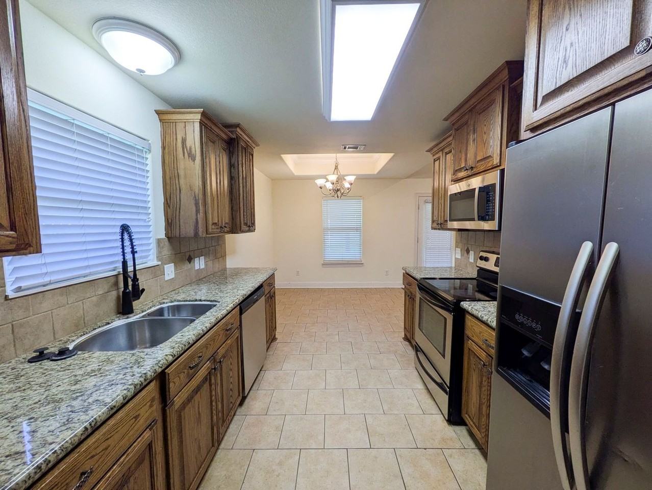 209 E 2nd St - Photo 7 of 22
