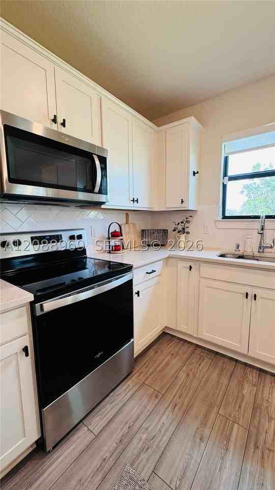 3117 Buttonwood Ct - Photo 4 of 35