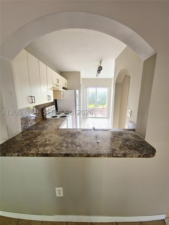 990 Ne 33rd Ter #102 - Photo 4 of 13