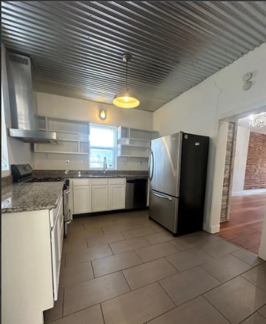 418 W 43rd Ave - Photo 5 of 9