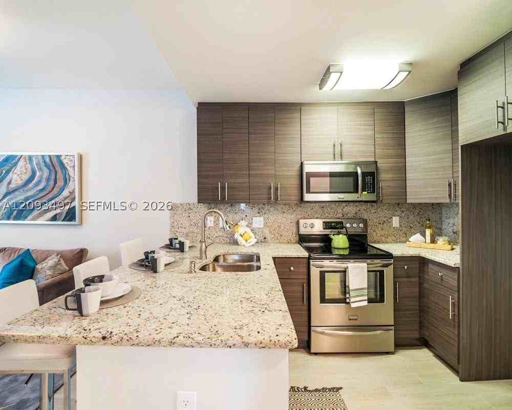 833 Sw 13th Ct #103 - Photo 2 of 11