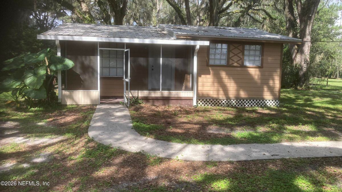 10302 Ne County Road 1469 - Photo 2 of 19