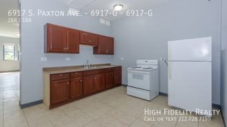 6901-17 S. Paxton/2211-17 E 69th St. - Photo 1 of 1