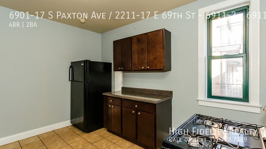 PAXTON AVE/ 2211-17 E 69TH & #6911-2 - Photo 4 of 10