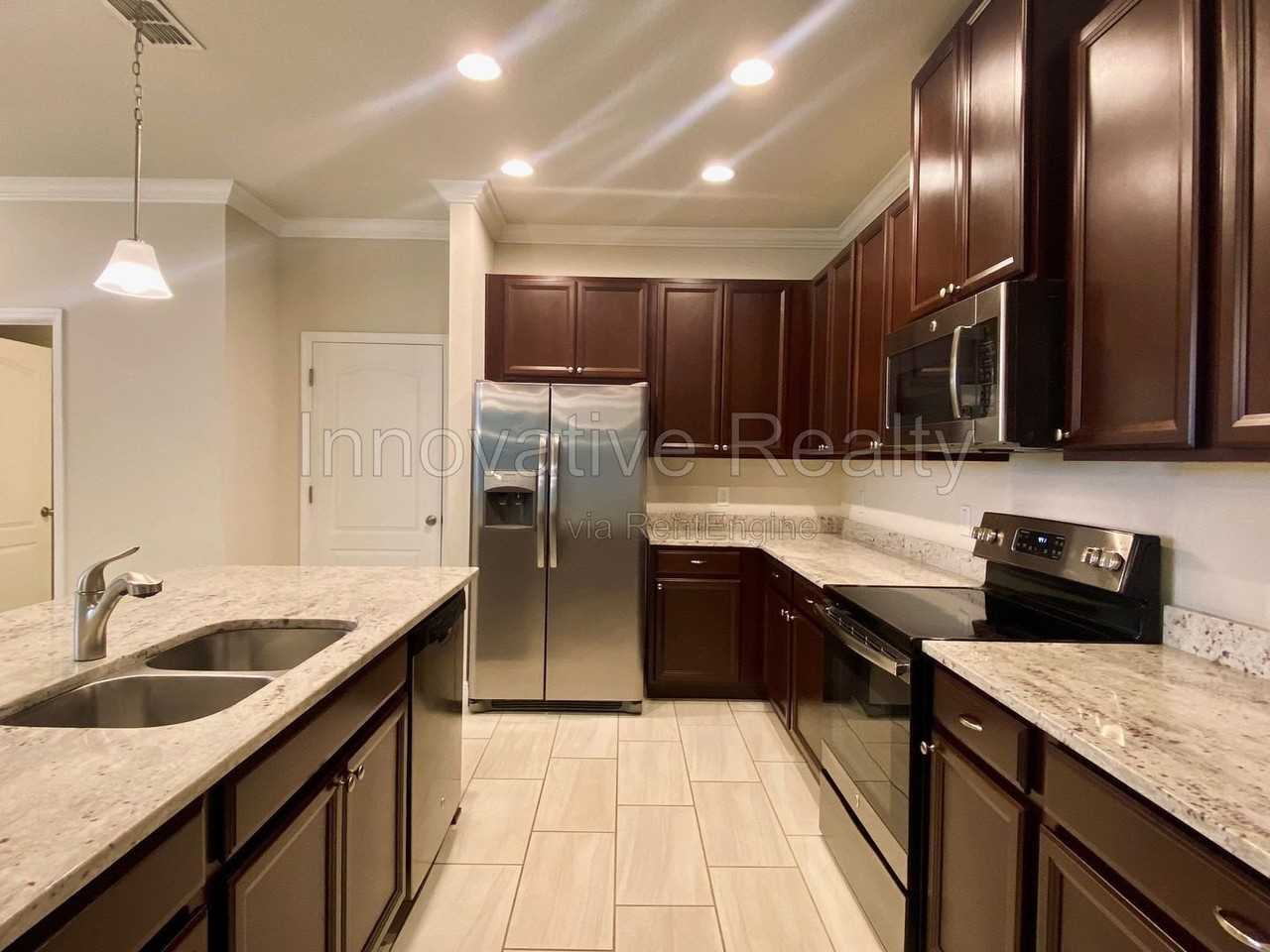 7640 Aloma Pines Ct - Photo 4 of 23