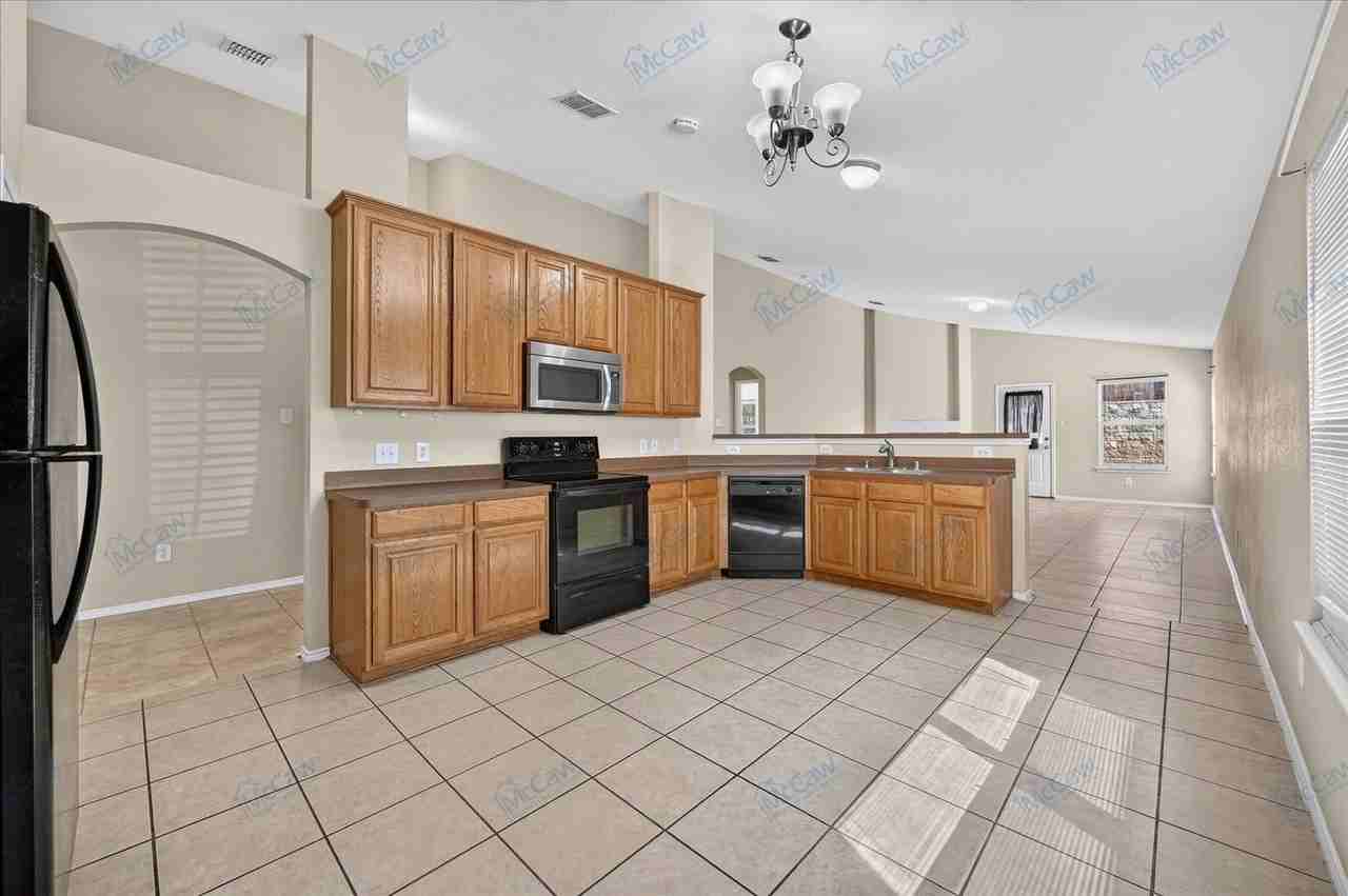 10104 Sourwood Dr - Photo 4 of 17