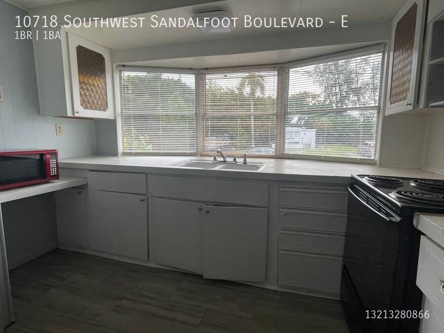 10718 Sandalfoot Blvd W #E - Photo 2 of 7
