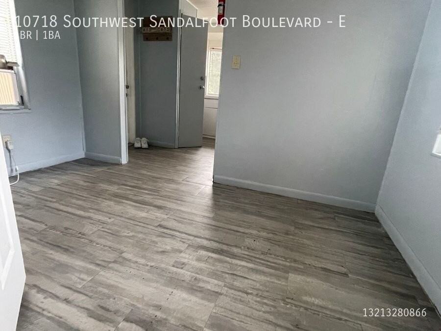 10718 Sandalfoot Blvd W #E - Photo 5 of 7