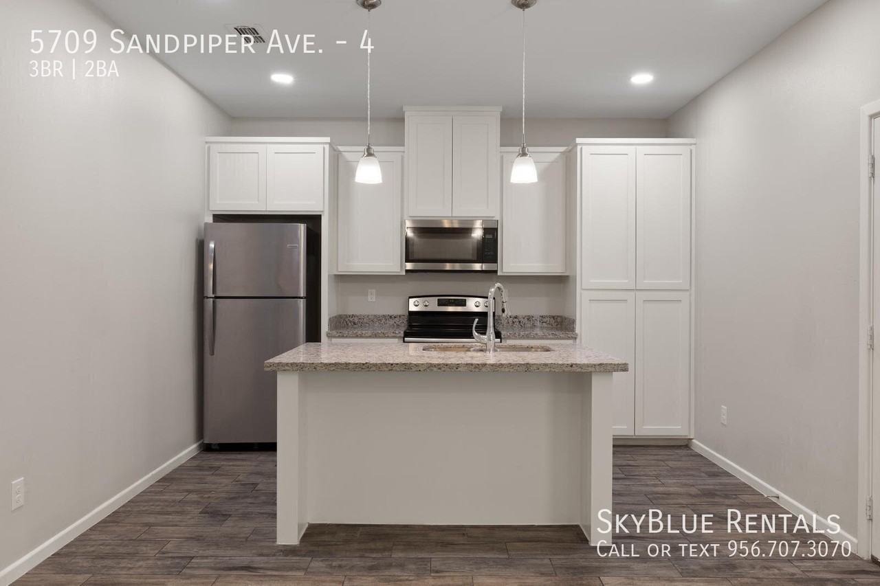 5709 Sandpiper Ave #4 - Photo 7 of 19