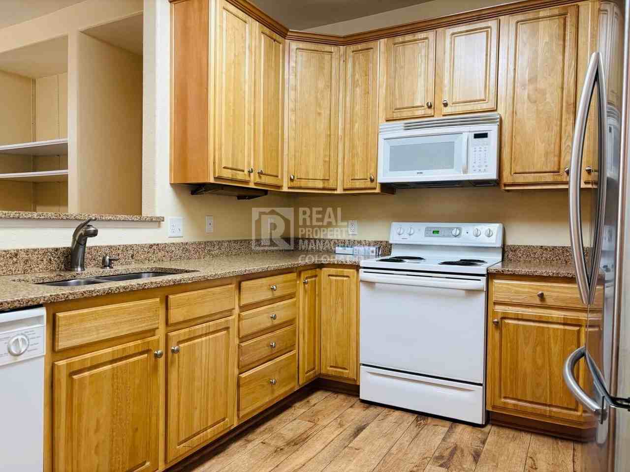 10341 W Girton Dr #103 - Photo 2 of 11