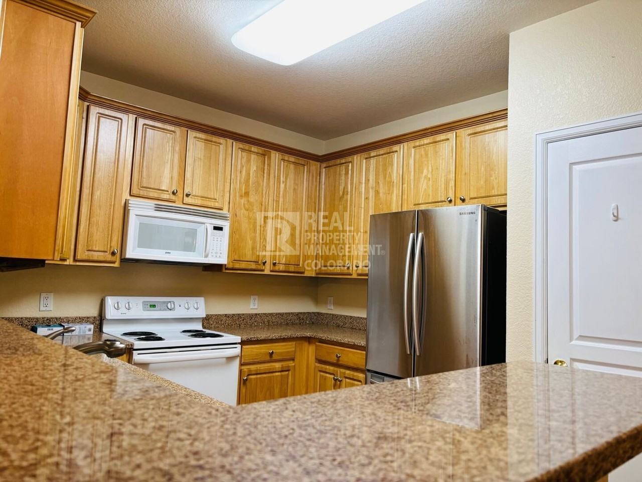 10341 W Girton Dr #103 - Photo 3 of 11