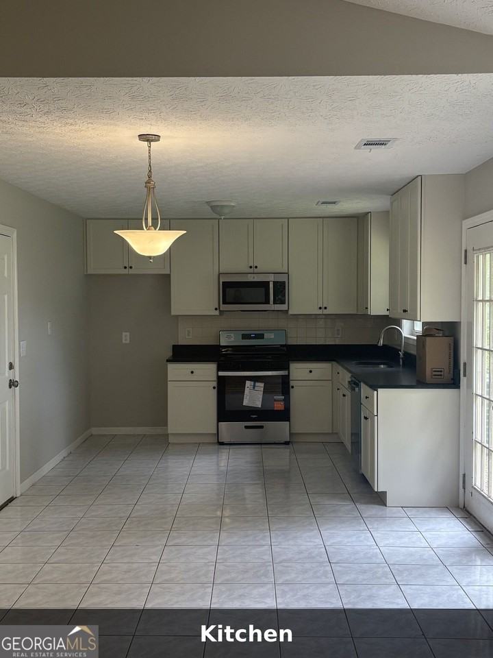 1119 Whisper Wind Dr - Photo 2 of 14