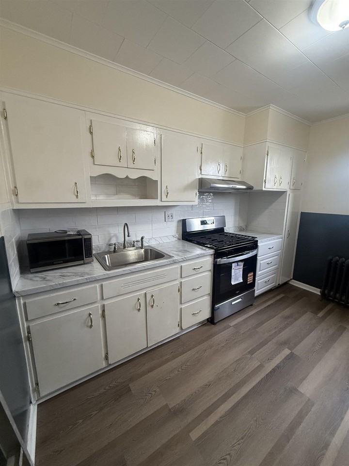611 87th N BERGEN MILLS RD #1 - Photo 6 of 11