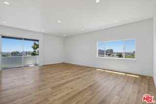 435 N Oakhurst Dr #1002 - Photo 2 of 8