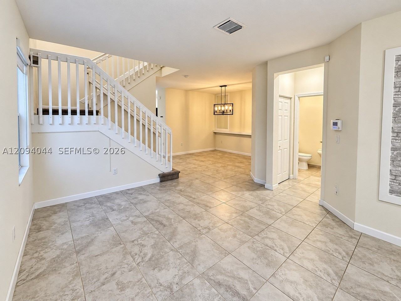 10306 W 33rd Ln - Photo 5 of 36