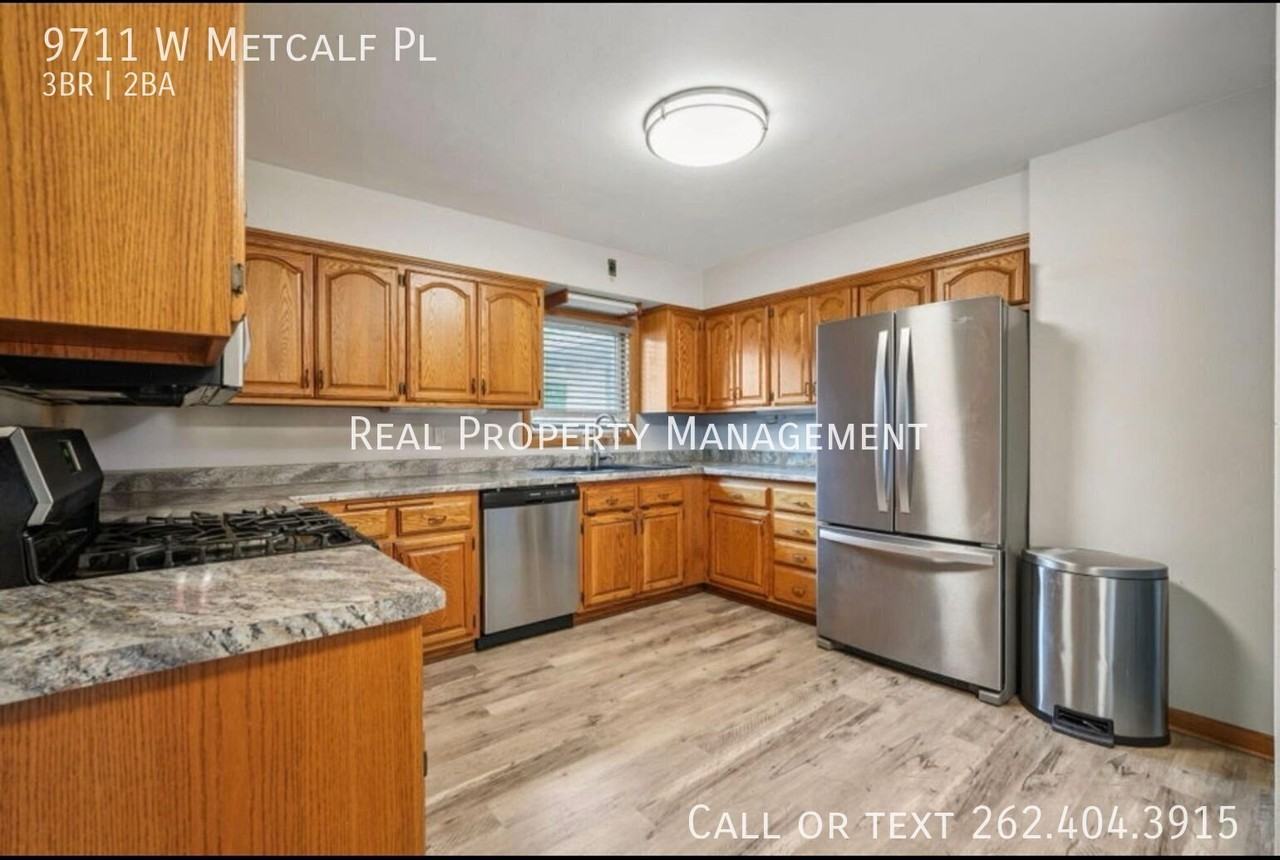 9711 W Metcalf Pl - Photo 2 of 10