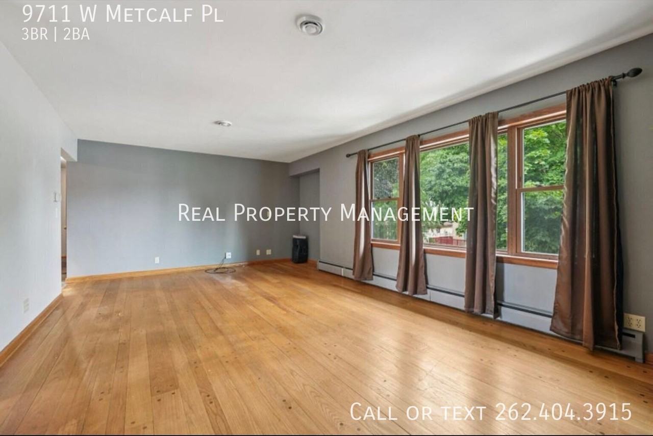 9711 W Metcalf Pl - Photo 4 of 10