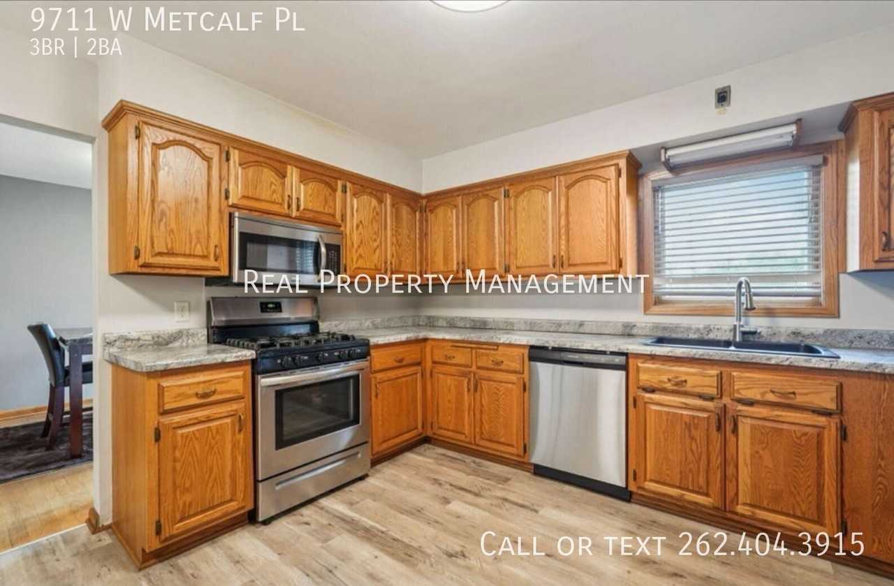 9711 W Metcalf Pl - Photo 6 of 10