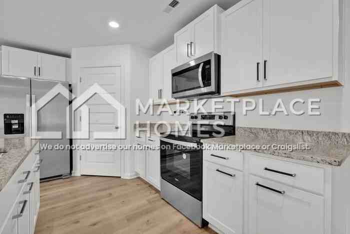 4244 Coal Creek Loop - Photo 5 of 29