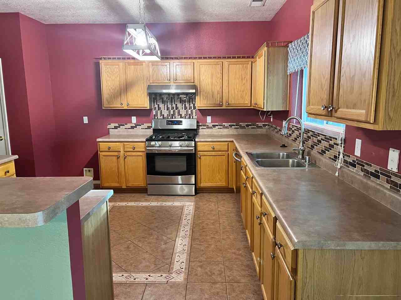 7705 La Brea St Ne - Photo 7 of 28
