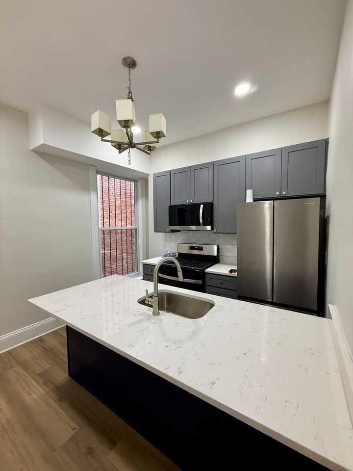 309 E 23rd St - Photo 5 of 20
