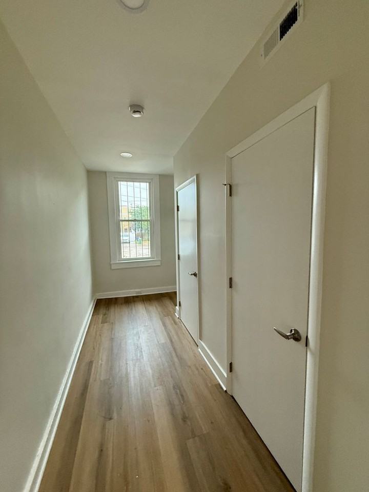 309 E 23rd St - Photo 7 of 20