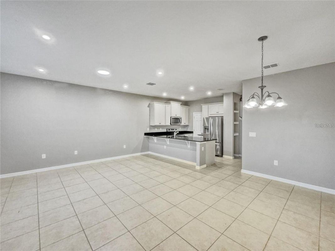 2424 Blowing Breeze Ave - Photo 5 of 23