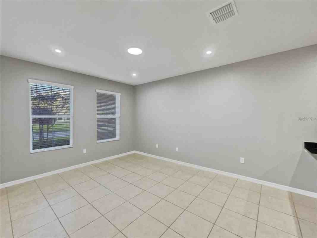2424 Blowing Breeze Ave - Photo 6 of 23
