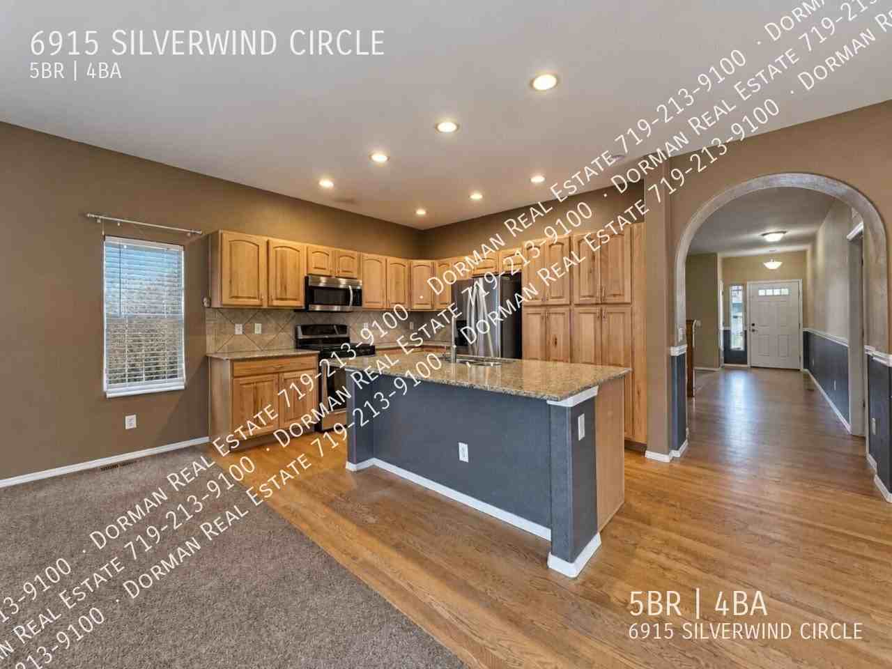6915 Silverwind Cir - Photo 2 of 33