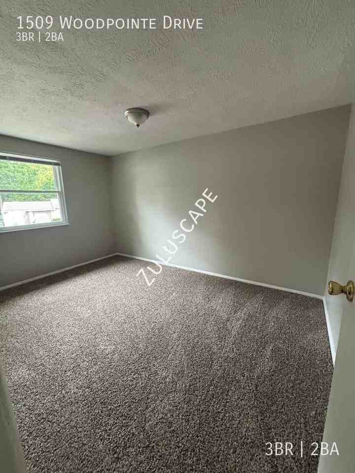 1509 Woodpointe Dr - Photo 7 of 14