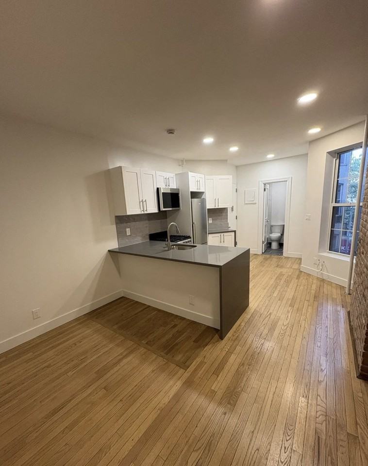 E 82nd St - Photo 2 of 6