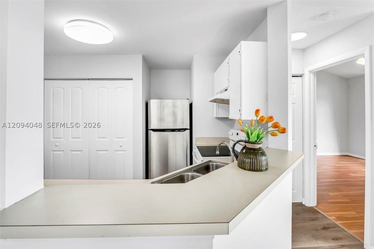 3433 Nw 44th St #203 - Photo 6 of 35