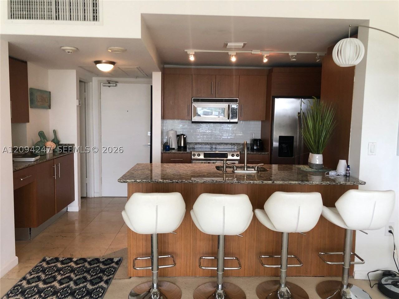 10275 Collins Ave #427 - Photo 4 of 12