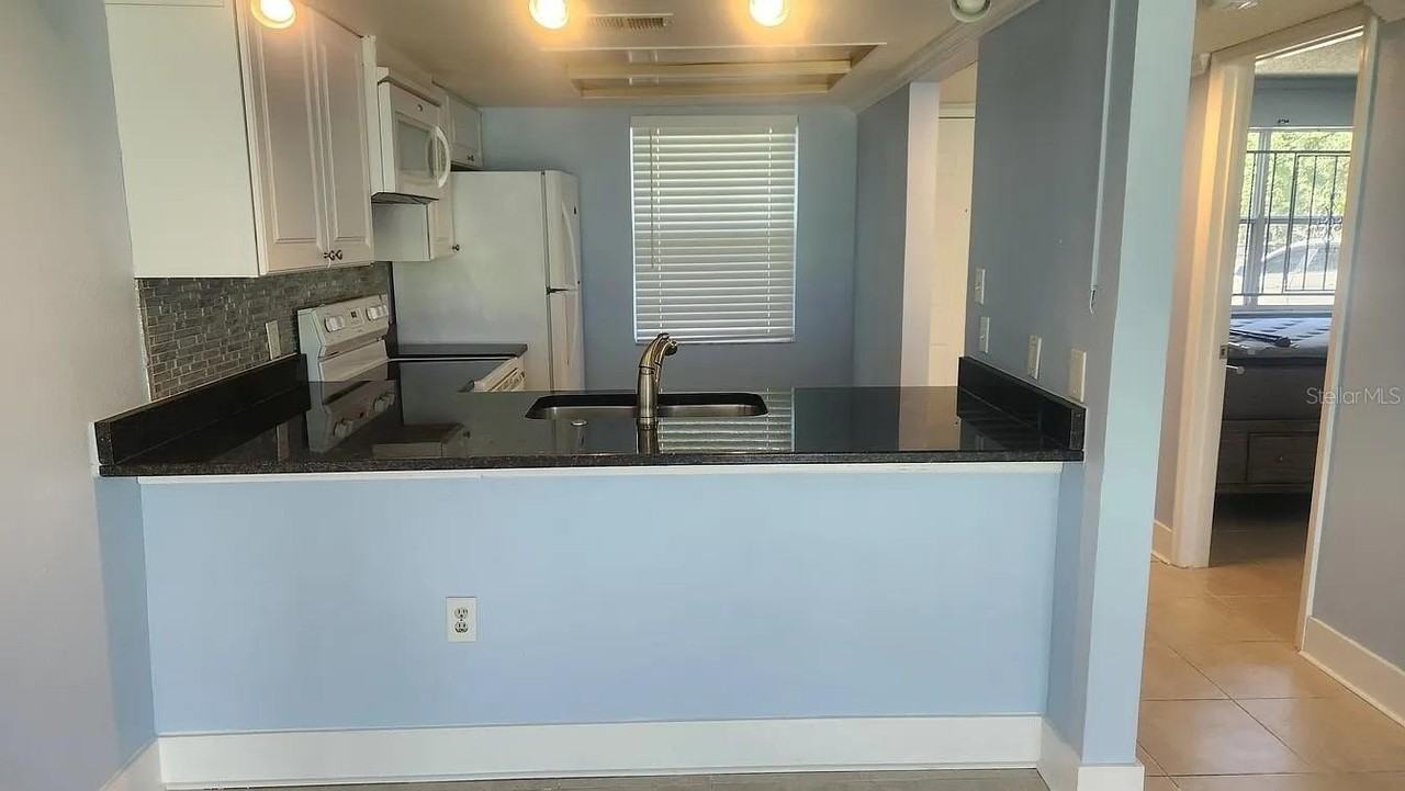 5038 Terrace Palms Cir #102 - Photo 3 of 11
