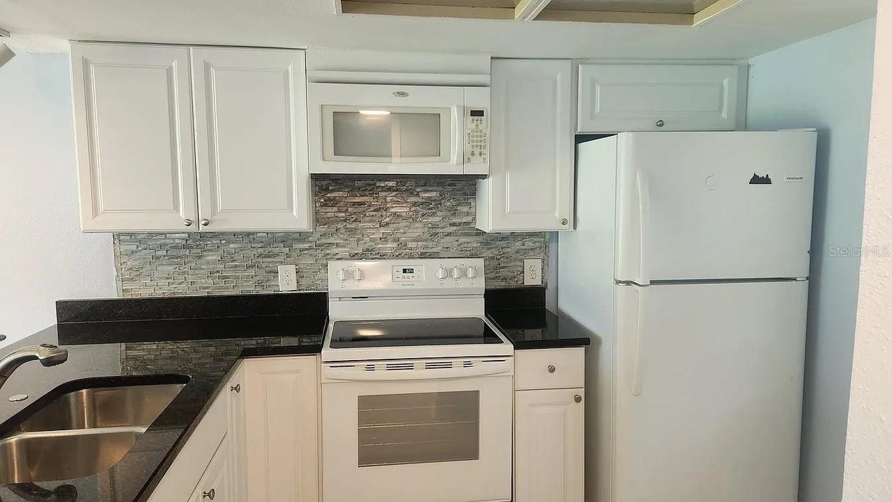 5038 Terrace Palms Cir #102 - Photo 4 of 11