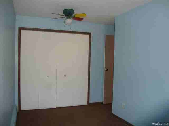 765 E Walled Lake Dr Apt B - Photo 3 of 11