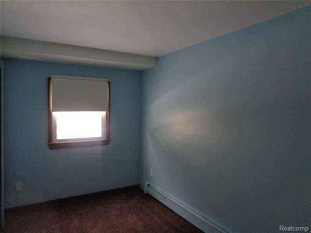 765 E Walled Lake Dr Apt B - Photo 4 of 11