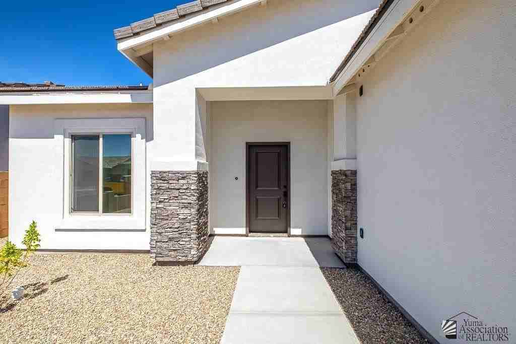 12596 E 51st Ln - Photo 3 of 30