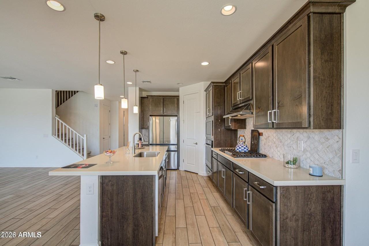 11341 E Ulysses Ave - Photo 5 of 50