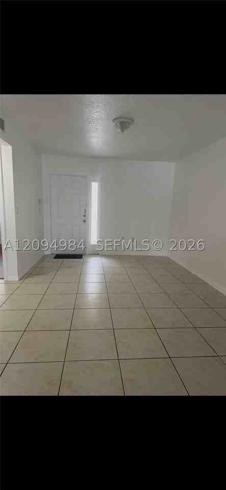 1261 Se 31st Ct #103-53 - Photo 3 of 13