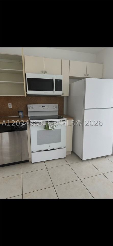 1261 Se 31st Ct #103-53 - Photo 4 of 13