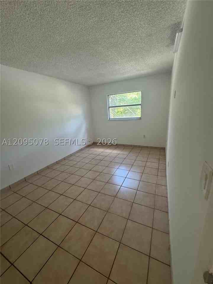 4265 Nw South Tamiami Canal Dr #1-214 - Photo 4 of 11